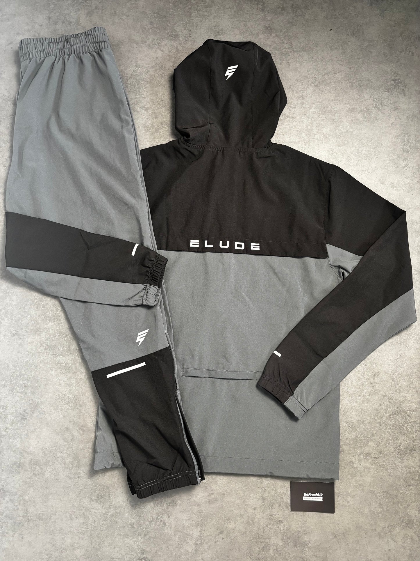 ELUDE TRACK TRACKSUIT BLACK/CHARCOAL GREY